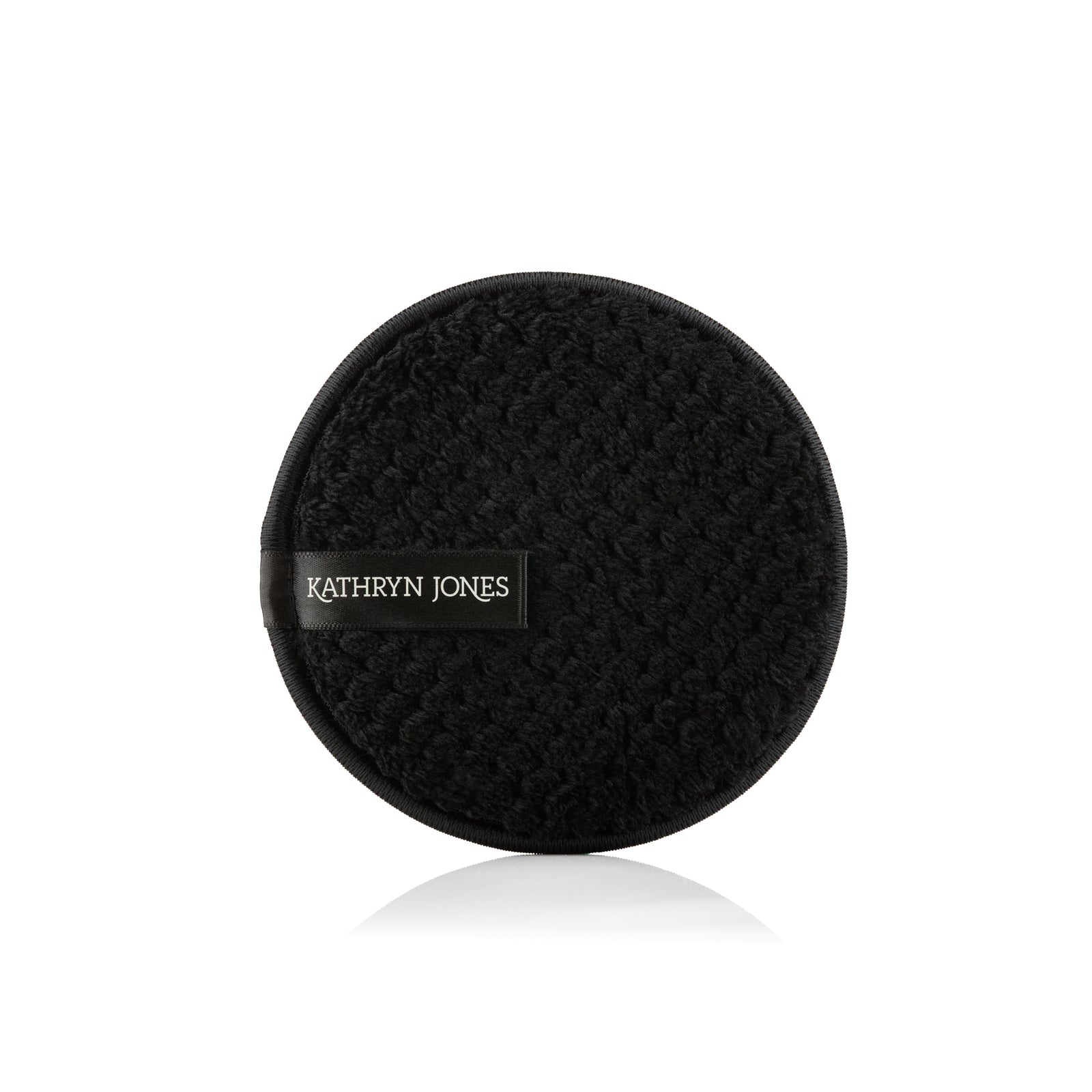 Kathryn Jones textured round cleansing sponge on a white background