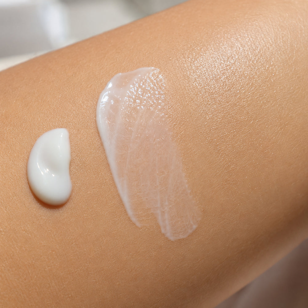 Woman's arm showing three stages of absorption of KJ Serums Ultra Light Solar Defence SPF 50 PA++++ sunscreen blending in with no white residue