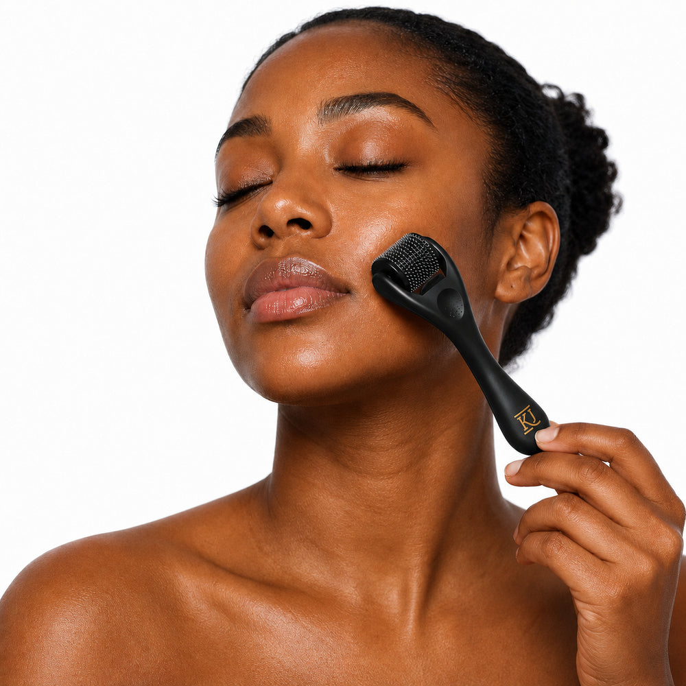 Woman using the Kathryn Jones Microneedling Device on her face
