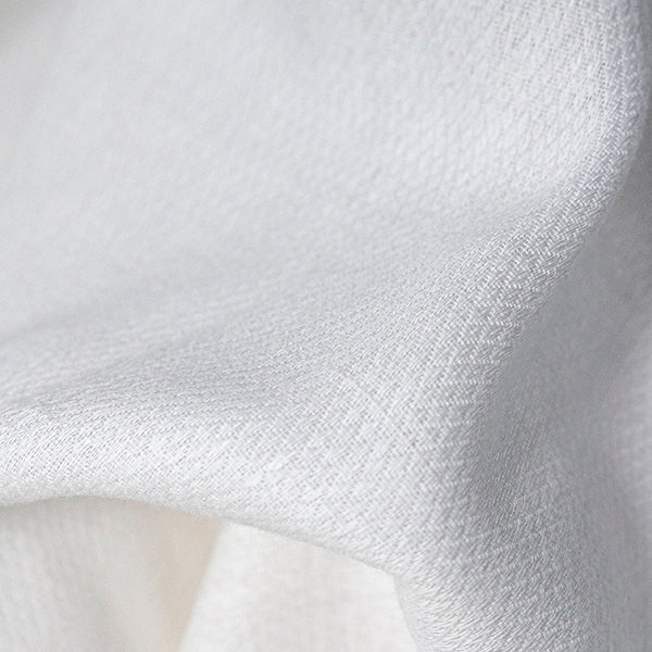 Close-up of Best Exfoliating Muslin Cloth for Face and Body.  Texture – Soft, Organic Cotton Weave for Gentle Daily Skin Exfoliation